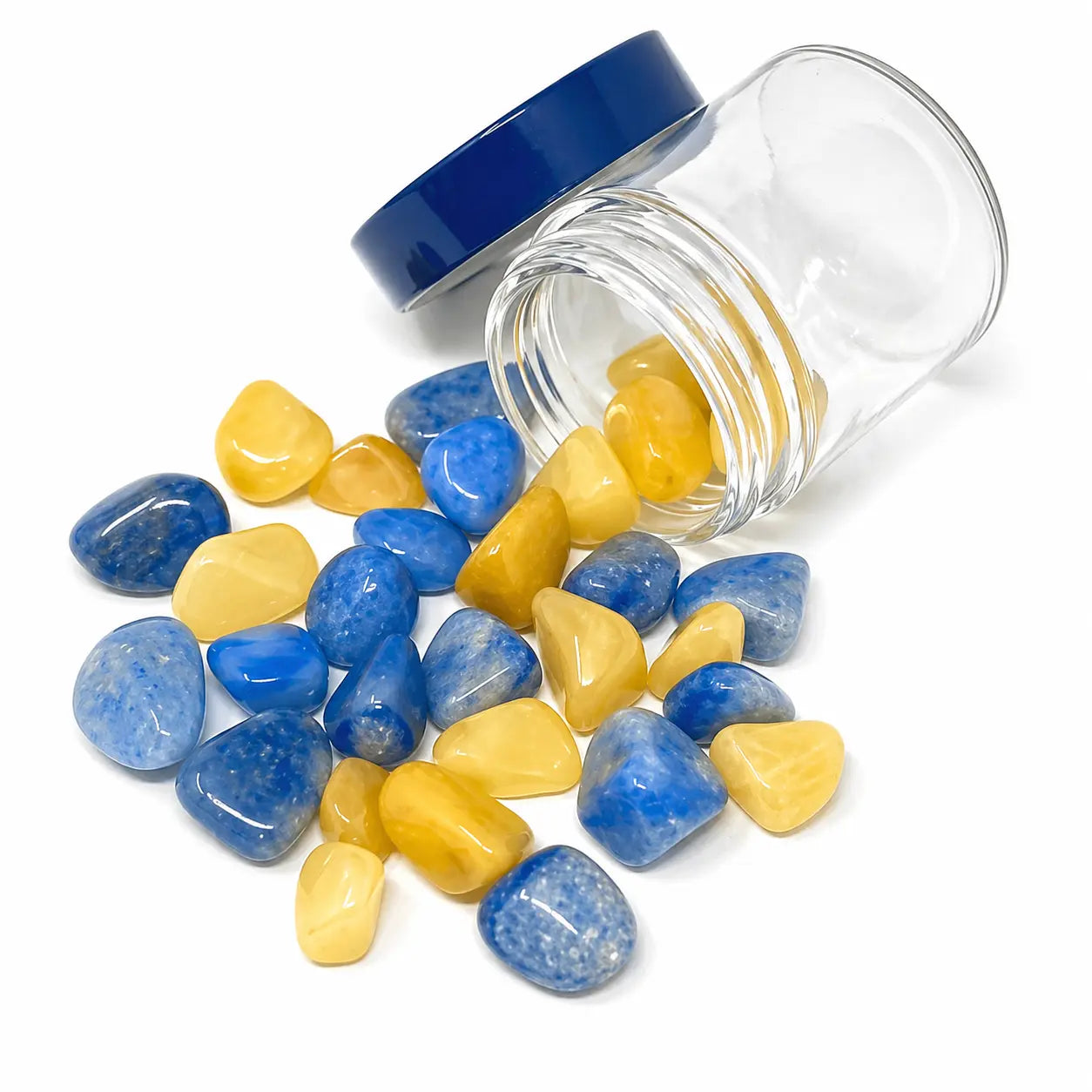Self-Growth crystal blend with Blue Quartzite and Yellow Quartz stones spilling from a 4oz glass jar for crystal water bottles