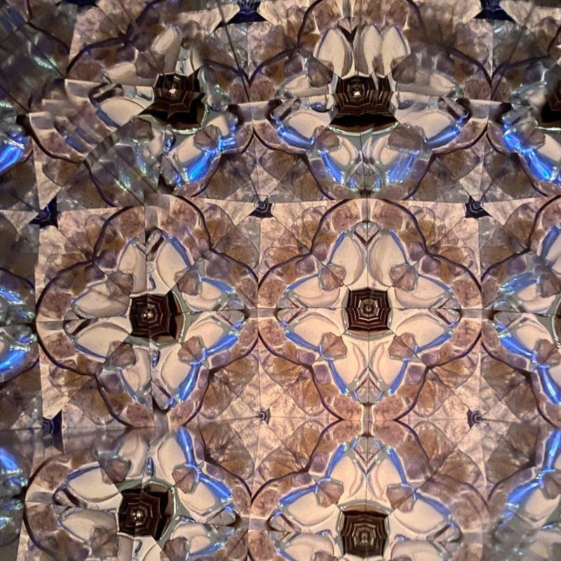 Kaleidoscope View – Intricate gemstone pattern in soft bronze and lavender tones.- Nymph Ki