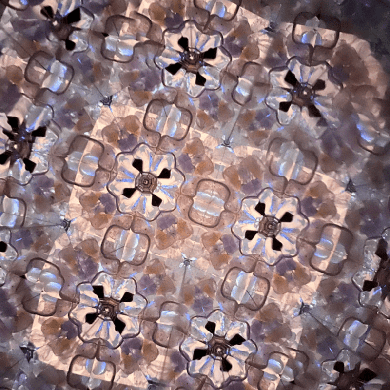 Kaleidoscope View – Geometric floral mandala design created with clear quartz and gold accents. - Nymph Ki