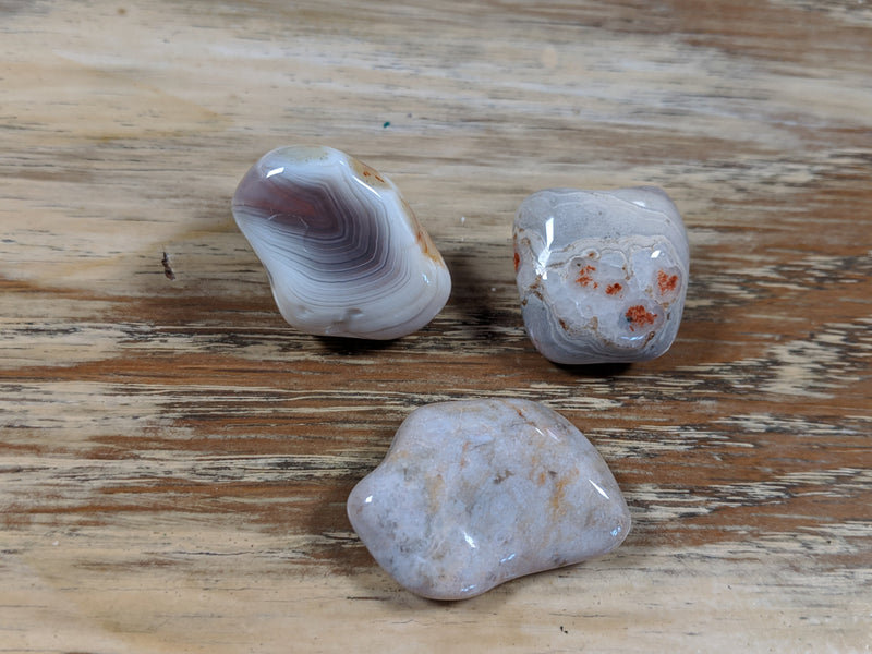 White quartz and howlite stones for the crown chakra, enhancing spiritual connection and peace.