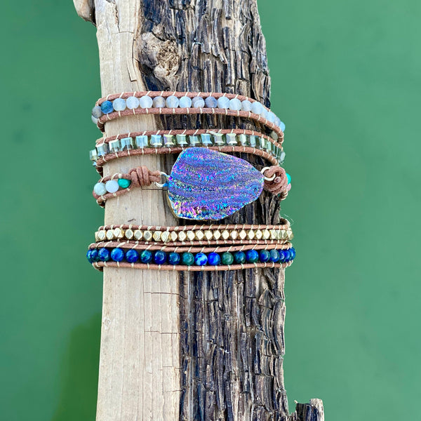Rainbow Titanium Aura Quartz wrap bracelet with layered beads and shimmer detail.